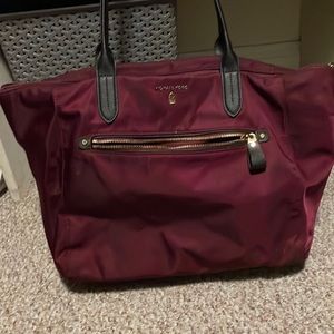 Michael Kors tote travel bag. Easily slides onto luggage when traveling.